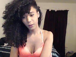Curly Black Trans with Giant Dick - ashemaletube.com