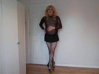 Black miniskirt and pantyhose - ashemaletube.com