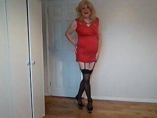 Blonde in red dress and black stockings with no panties on - ashemaletube.com
