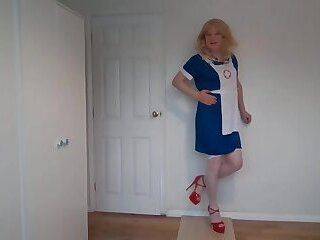 Blonde in nurse uniform and white stockings - ashemaletube.com